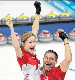  ?? AP PHOTO/AARON FAVILA ?? Canada’s Kaitlyn Lawes, left, and John Morris jubilate after winning their mixed doubles curling finals match against Switzerlan­d at the 2018 Winter Olympics in Gangneung, South Korea, Tuesday. Canada won the gold medal.
