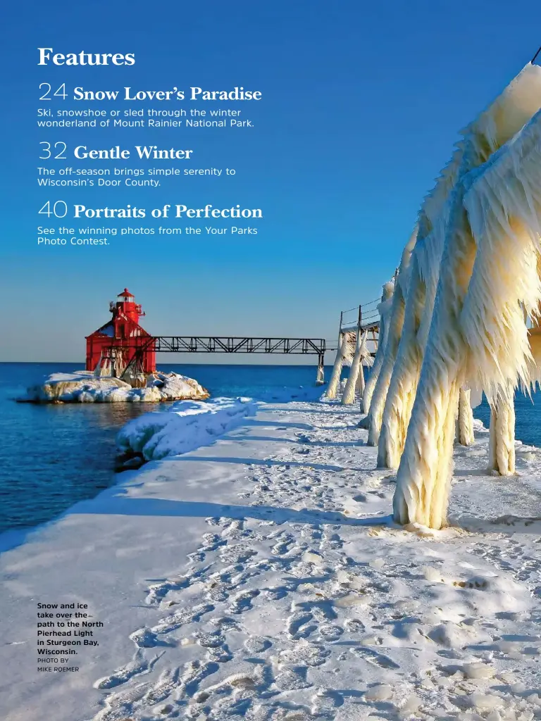  ?? PHOTO BY MIKE ROEMER ?? Snow and ice take over the path to the North Pierhead Light in Sturgeon Bay, Wisconsin.