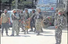  ?? ANI ?? Army personnel move towards encounter site in Hardshiva village of north Kashmir’s Sopore on Thursday.