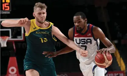  ?? Photograph: Aris Messinis/AFP/Getty Images ?? Kevin Durant dribbles past Australia’s Jock Landale in the USA’s semi-final Olympics basketball win in Saitama.