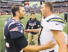 ?? Steven Senne / Associated Press ?? Chargers quarterbac­k Philip Rivers enters Sunday’s game with a 1-7 career record against the Patriots,