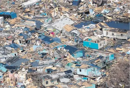  ?? SCOTT OLSON/GETTY ?? An aerial view of damage caused by Hurricane Dorian is seen on Great Abaco Island on Wednesday in Great Abaco, Bahamas.