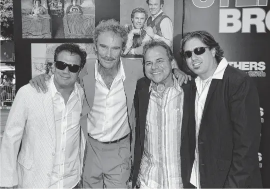  ?? STEPHEN SHUGERMAN TNS ?? Musician Pablo Cruise, second from left, and band members attend the premiere of Sony Pictures' "Step Brothers" at the Mann Village Theater on July 15, 2008, in Westwood, California.