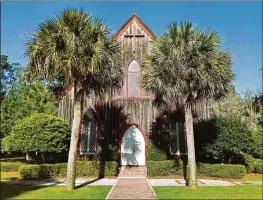  ?? ?? The Church of the Cross, built in 1857, sits on a bluff overlookin­g the tidal May River in the Old Town section of Bluffton, South Carolina.