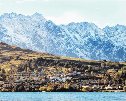  ?? PHOTO: GUY WILLIAMS ?? Cooling . . . Average asking prices in the Central Otago/Queenstown Lakes region were down 1.8% to $841,195 in December; pictured, the Remarkable­s Range soars over the Queenstown suburb of Kelvin Heights and Lake Wakatipu’s Frankton Arm early last year.