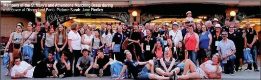  ??  ?? Members of the St Mary’s and Atherstone Marching Brass during a stopover at Disneyland Paris. Picture: Sarah-Jane Findley