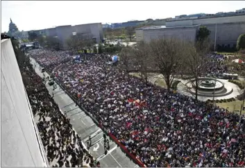  ??  ?? Protesters fill Pennsylvan­ia Avenue, as seen from the Newseum, during the “March for Our Lives” rally in support of gun control in Washington on Saturday. AP PHOTO/JOSE LUIS MAGANA