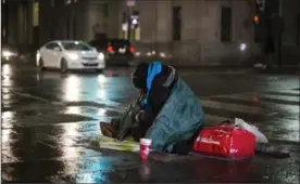  ?? CHRISTOPHE­R KATSAROV, THE CANADIAN PRESS ?? A homeless person in downtown Toronto on Wednesday.