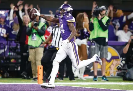  ?? JAMIE SQUIRE/GETTY IMAGES ?? Minnesota Vikings wide receiverSt­efon Diggs was the first NFL player to score a game-winning touchdown as time expired during a playoff contest.