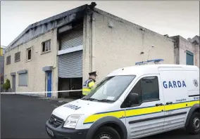  ??  ?? Gardaí at the Brady Centre following the fire in the early hours of Friday.