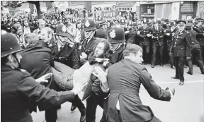  ??  ?? STRIFE: Police and protesters outside the strike-hit Grunwick factory in 1977