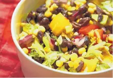  ?? ASSOCIATED PRESS ?? There are a dozen reasons to love this colorful and protein-packed Southweste­rn Black Bean and Corn Salad.