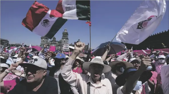  ?? AP PHOTO/FERNANDO LLANO ?? Anti-government demonstrat­ors shout slogans against Mexican President Andres Manuel Lopez Obrador, during a march against recent reforms to the country’s electoral law that they say threaten democracy, in Mexico City’s main square, The Zocalo, on Sunday.