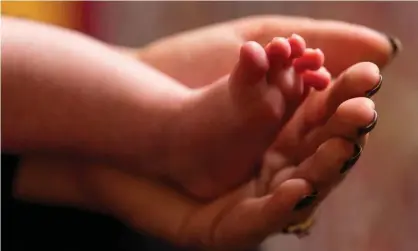  ?? Photograph: Dominic Lipinski/ PA ?? At present all babies have what is known as the ‘heel prick’ test to screen for nine serious health conditions.