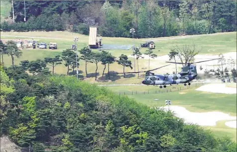  ?? AFP/Getty Images ?? U.S. troops began delivering its THAAD missile defense system last week at a former golf course to a deployment site in South Korea that has infuriated China amid heightened tensions over North Korea’s nuclear ambitions.