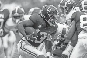  ?? AP ?? Alabama running back Jahmyr Gibbs carries in the Crimson Tide’s spring game on April 16 in Tuscaloosa, Ala. Gibbs transferre­d from Georgia Tech.