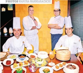  ?? PHOTOS WARUNA WANNIARACH­CHI ?? Chef Bun Boon, Patrick and team