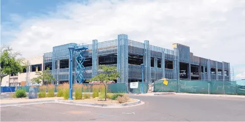  ?? GREG SORBER/JOURNAL ?? Constructi­on of New Mexico Orthopedic­s’ office complex is underway at Winrock Town Center.
