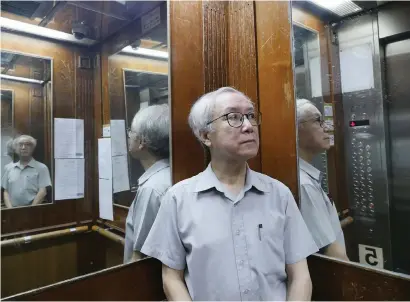  ?? Picture: Reuters ?? PROFITS DOWN. Landlord Ng Goon-lau, 66, inside the lift of a building where two suicides have taken place in his property, in Hong Kong, China.