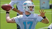  ?? DAVID SANTIAGO / MIAMI HERALD ?? Dolphins QB Ryan Tannehill, who hasn’t played since December 2016, has been working to re-establish himself as the offense’s leader.