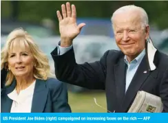  ??  ?? US President Joe Biden (right) campaigned on increasing taxes on the rich — AFP