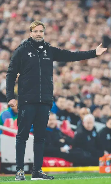  ?? Picture: AFP PHOTO ?? THRILLED: Liverpool manager and passionate football fan Jurgen Klopp was on cloud nine after his team ended Manchester City’s lengthy winning streak.