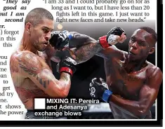  ?? ?? ■ MIXING IT: Pereira and Adesanya exchange blows