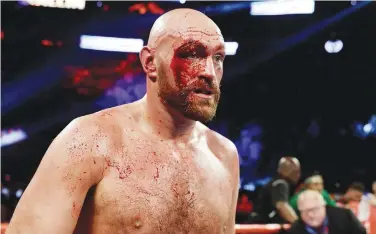  ?? File / Reuters ?? ↑
Following a controvers­ial draw in December 2018, Tyson Fury (above) overpowere­d Deontay Wilder in Las Vegas in February, beating him in seven rounds.