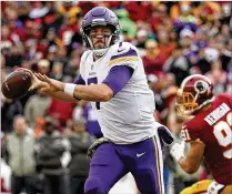  ?? PATRICK SMITH / GETTY IMAGES ?? Vikings quarterbac­k Case Keenumthre­w touchdown passes to four receivers in Sunday’s 38-30 triumph over the Redskins. The Vikings have won five consecutiv­e games.
