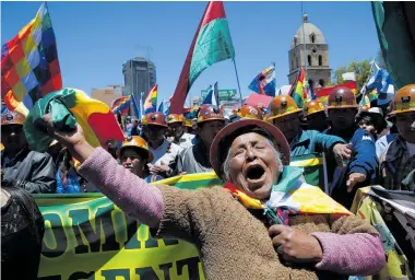  ?? Photos / AP ?? Indigenous Bolivians have come under attack while protesting against the ouster of Evo Morales as President.