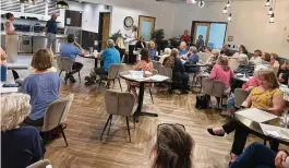  ?? RICK MCCRABB / STAFF ?? About 75 people packed the Central Connection­s cafeteria July 25 to discuss their concerns about the future of the senior center with Executive Director Diane Rodgers and Board President Rick Fishbaugh.