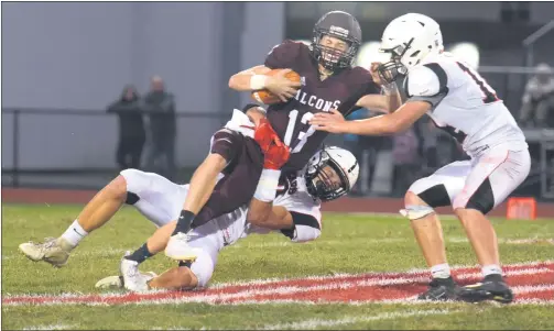  ?? AUSTIN HERTZOG - MEDIANEWS GROUP FILE ?? Pottsgrove quarterbac­k Joe Silvestri is tackled in the backfield by Boyertown’s Anthony Billetta during a game last season.