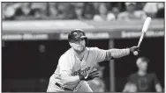  ?? AP/Tony Dejak ?? Boston Red Sox’s Christian Vazquez bats against the Cleveland Indians in the tenth inning on Tuesday in Cleveland.