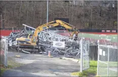  ?? Tyler Sizemore / Hearst Connecticu­t Media ?? The Cardinal Stadium bleachers are torn down at Greenwich High School on Dec. 8.