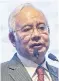  ?? Najib: Attributes power to Felda ??