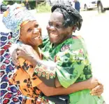  ?? ?? Elderly women hug in celebratio­n of the gift they received from First Lady Dr Auxillia Mnangagwa for composing a song aimed at raising awareness about cholera during an interactiv­e session in Masvingo yesterday