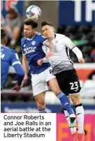  ??  ?? Connor Roberts and Joe Ralls in an aerial battle at the Liberty Stadium