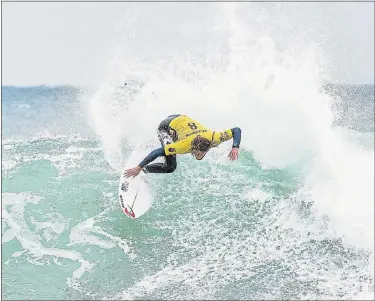  ?? Picture: WSL/KELLY CESTARI ?? MOVING UP: Current Jeep Leaderboar­d No 1 Matt Wilkinson, of Australia, advances to round three of the Corona Open J-Bay after defeating wildcard Michael February, of South Africa, in heat 2 of round two at Supertubes, Jeffreys Bay, yesterday