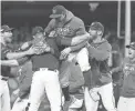  ?? PATRICK SMITH/GETTY IMAGES ?? The Nationals celebrate winning the National League Championsh­ip Series against the Cardinals Tuesday at Nationals Park in Washington.