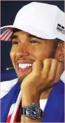  ?? (Reuters) ?? MERCEDES DRIVER Lewis Hamilton smiles in a news conference on Sunday in Mexico after securing his fourth Formula One world championsh­ip.