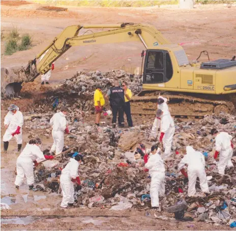  ??  ?? Police search through rubbish at Arundel tip in May 1999 for the body of Japanese millionair­e Hamago Kitayama who was reported missing by wife Akiko. She was later charged and jailed for the murder of the ex-Yakuza crime boss.