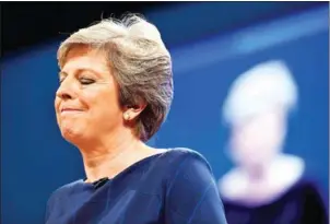  ?? OLI SCARFF/AFP ?? Britain’s Prime Minister Theresa May delivers her speech on the final day of the Conservati­ve Party annual conference in Manchester, northwest England, on October 4.