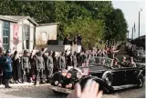  ??  ?? Hitler’s motorcade leaves a railway siding flanked by a line of security. Note Hitler and the Italian dictator Benito Mussolini in the leading vehicle