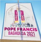  ?? ZAID AL-OBEIDI/GETTY-AFP ?? A sign welcomes the pope Sunday outside a Catholic church in Iraq. The March 5-8 trip is expected to provide a spiritual boost to Iraq’s Christians.