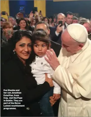  ??  ?? Eva Sheeba and her son Jonathan Estaiffan, from Iraq, met the Pope in Dublin. They are part of the Doras Luimní resettleme­nt programme.