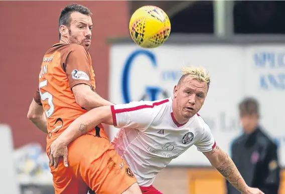  ??  ?? Dundee United’s Paul Quinn is back training after a recent health scare sidelined the defender.