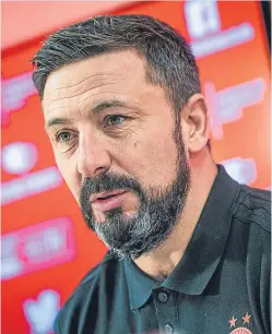  ?? Picture: SNS. ?? Aberdeen manager Derek McInnes has a strong bond with the players at Pittodrie.