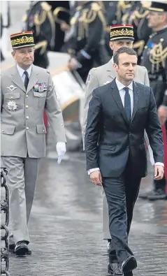  ?? Picture: Getty. ?? Emmanuel Macron at the Arc de Triomphe after the handover ceremony.