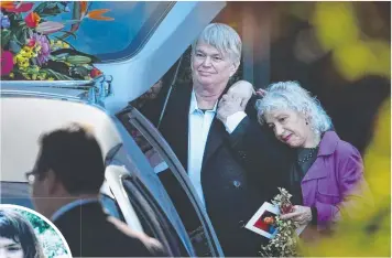  ?? Pictures: DAVID CAIRD ?? SAD DAY: Jeremy Dixon is comforted as he farewells his daughter Eurydice (left); and a mourner waves as the hearse departs (below).
