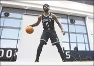 ?? Emilee Chinn / Getty Images ?? Kyrie Irving of the Brooklyn Nets poses for a photograph during Media Day at HSS Training Center on Friday in New York.